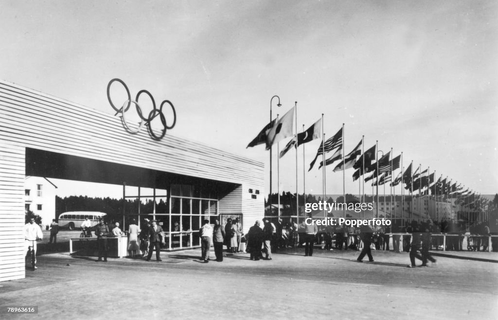 Sport. 1952 Olympic Games in Helsinki. The entrance to the Olympic Village, showing the flags of the participating nations.