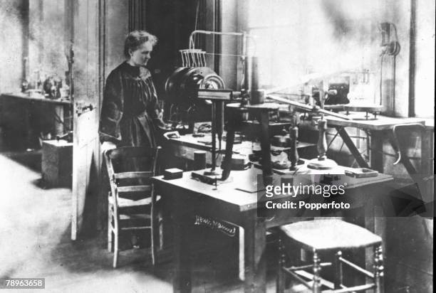 Polish-French physicist Marie Curie in her laboratory, circa 1900.