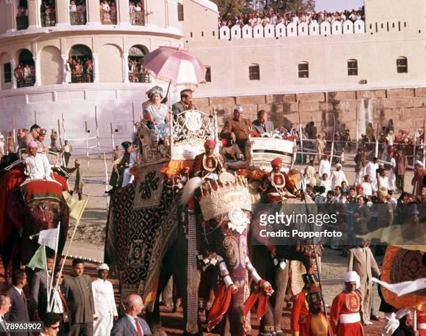 Royal Tour to India, Queen Elizabeth II is pictured taking an elephant ride in the town of Banares