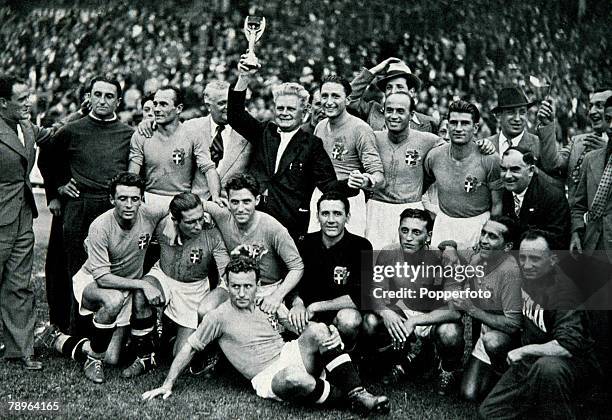 World Cup 1938, Final, Paris, France, 19th June Italy 4 v Hungary 2, The Italy team and staff celebrate with the Jules Rimet trophy after they won...