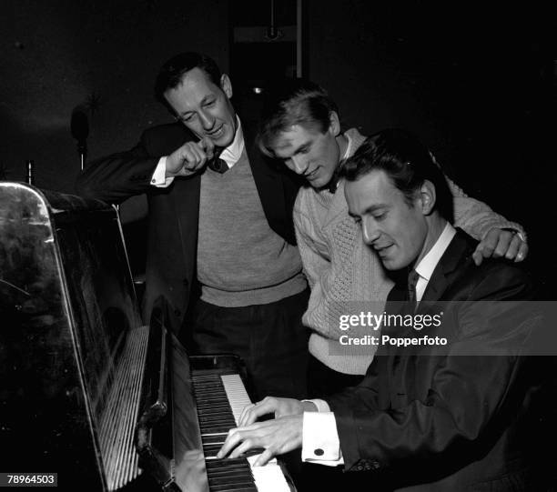 England BBC Producer Brian Matthew is pictured with singer Adam Faith and musician and producer John Barry on Saturday Club