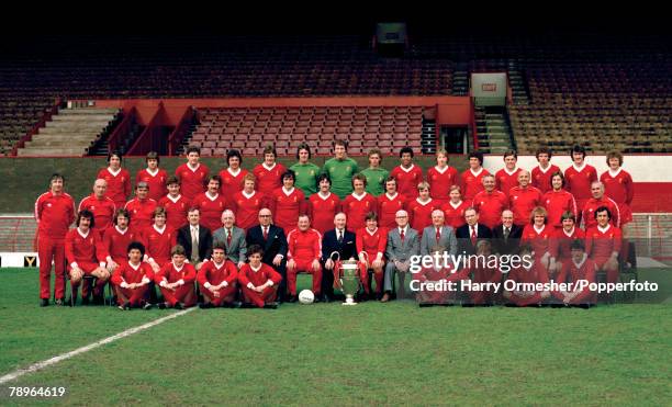 Liverpool FC players and officials line up for a team photograph with the European Cup at Anfield in Liverpool, England, circa July 1978. Back row :...