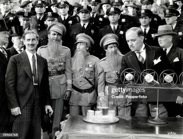 The Book, Volume 1, Page Picture A picture of American film comedians The Marx brothers, L-R: Groucho, Zeppo, Chico, and Harpo