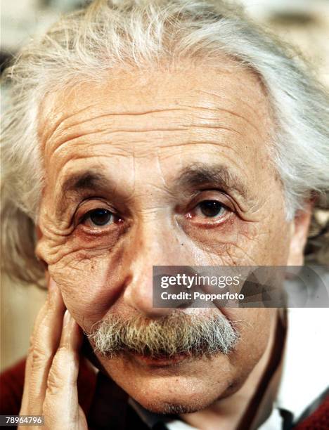 German born American theoretical physicist Albert Einstein in his library study at home on 112 Mercer Street in Princeton, New Jersey, United States...