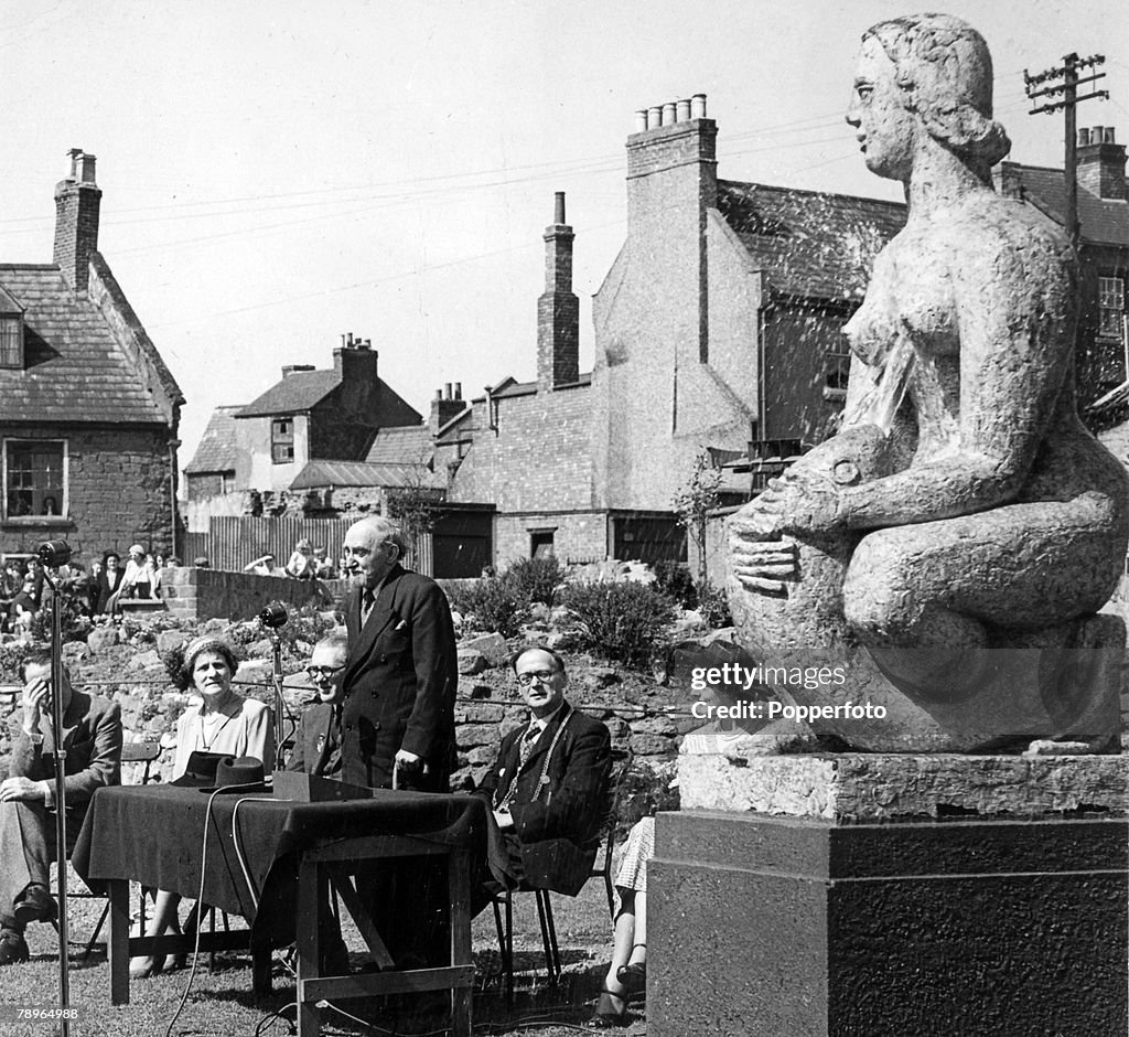 Social History. Northampton, Northamptonshire, England. pic: circa 1950's. The unveiling of a statue woman and fish, Northampton showing Sir Frank Dobson, sculptor, Ald. J.V.Collier, Mrs. C.A.Chown, Ald. Chown, Ald. Frank Lee (Mayor).