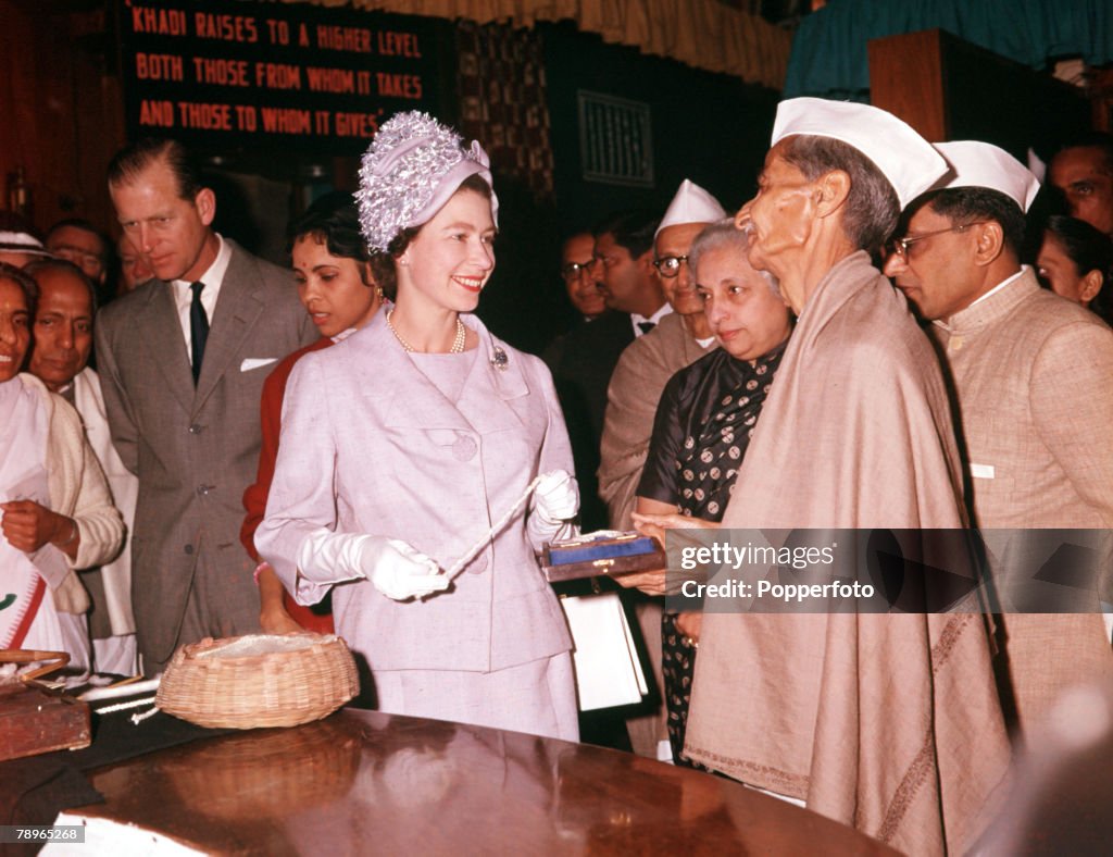 1961. Royal Tour to India. Queen Elizabeth II and Prince Philip, the Duke of Edinburgh, are pictured visiting a crafts centre in Delhi.