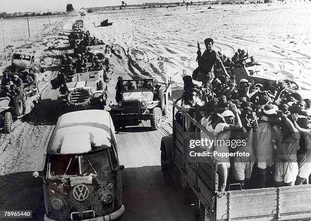 War and Conflict, The 1967 Six Day War, Middle East, Egyptian POW's pass Israeli troop carriers during the battle