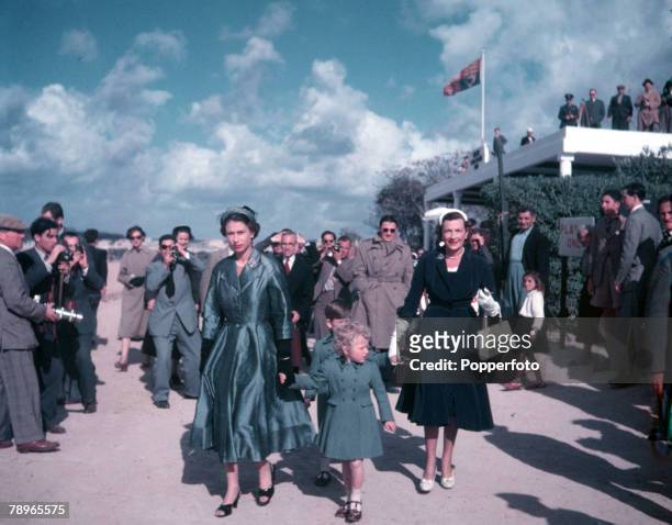 Royal Tour of Malta, Queen Elizabeth II is pictured with Prince Charles, Princess Anne and Lady Mountbatten at the Marsa Polo ground, where they...