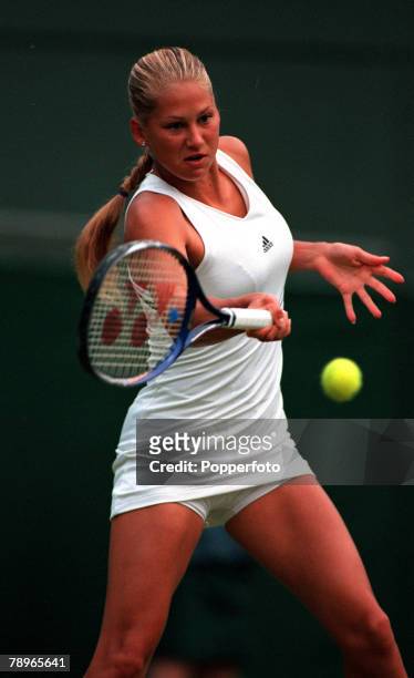 Tennis, Wimbledon Lawn Tennis Championships, Women+s Singles Second Round, 28th June 2000, Russia+s Anna Kournikova hits a forehand in her match with...