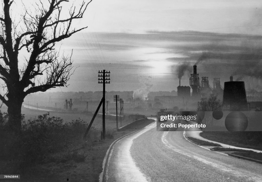 Industry. Northamptonshire, England. pic: circa 1950. A view from the Finedon - Wellingborough road, showing the blast furnaces at Wellingborough.