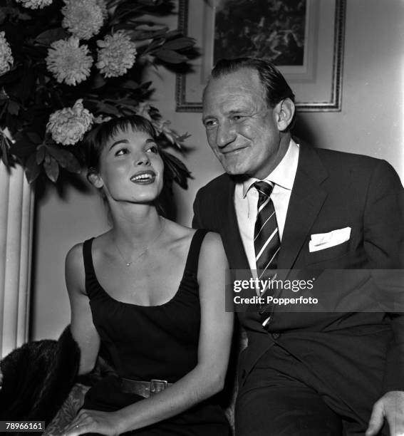 England Actress Elsa Martinelli is pictured with actor Trevor Howard at a press reception at the Mayfair Hotel for the film "Manuela"