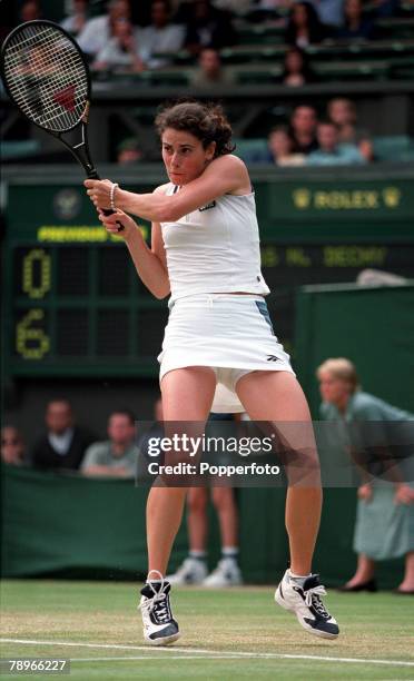 Tennis, Wimbledon Lawn Tennis Championships, Women+s Singles, 3rd Round, 1st July 2000, France+s Nathalie Dechy plays a double-handed backhand in her...