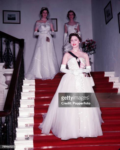 Princess Margaret's Caribbean Tour, Princess Margaret is pictured descending the grand staircase at her first State Banquet held in Government House,...