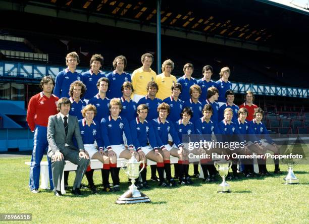 Glasgow Rangers line up for a team photograph alongside their trophies at Ibrox Stadium in Glasgow, Scotland, circa August 1978. Back row : Alex...