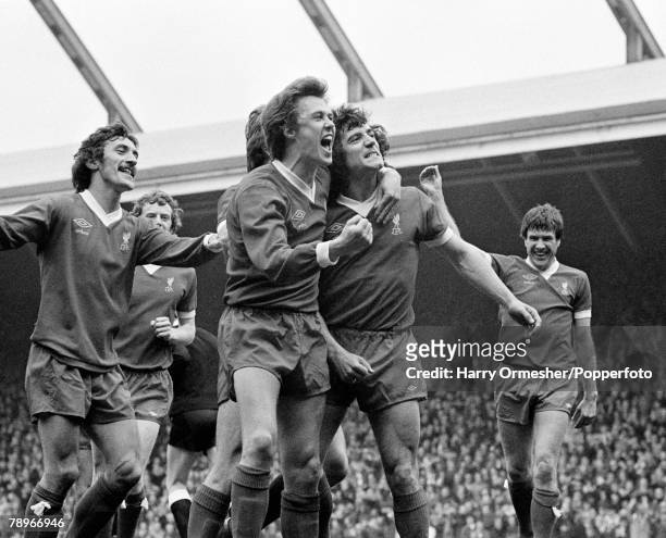 Kevin Keegan of Liverpool celebrates after scoring with teammates during the Football League Division One match between Liverpool and Manchester City...