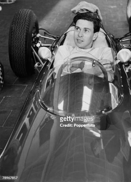 Sport, Motor Racing, Circa 1960's, Portrait of Grand Prix driver Jim Clark sitting in his car