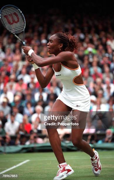 Tennis, Wimbledon Lawn Tennis Championships, Women+s Singles, Final, 8th July 2000, USA+s Venus Williams hits a double-handed backhand during her...
