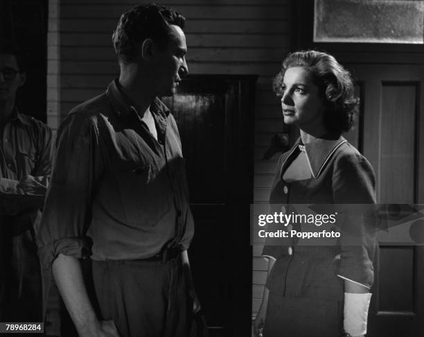 England Elizabeth Sellars and Peter Finch are pictured in a scene from the film "The Shiralee"