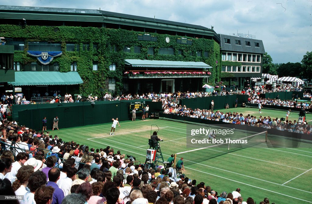 The Book. Volume 1: Page 11, Picture 4. 1991. Wimbledon Lawn Tennis Championships. A general view of a match in progress on Court 3.