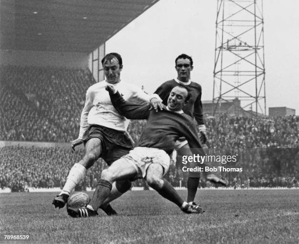 Football, 12th August 1967, English League Division One, Manchester United 3 v Tottenham Hotspur 3, Manchester United's Nobby Stiles tackles...