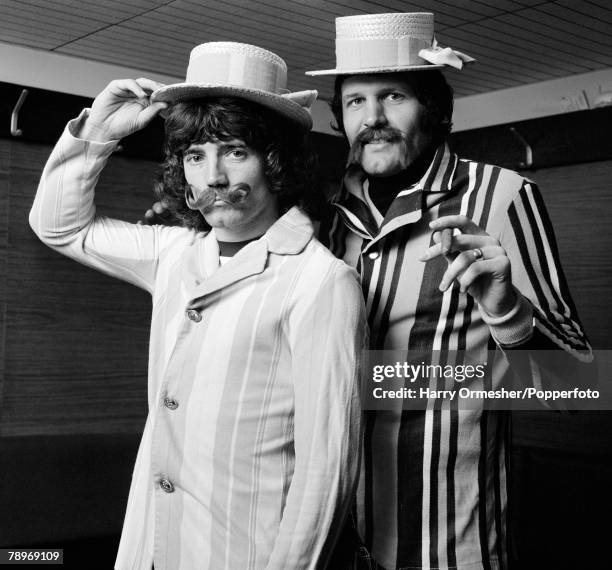 Liverpool FC footballers Kevin Keegan and John Toshack making an appearance as "old time music hall" performers, at Anfield in Liverpool, circa March...