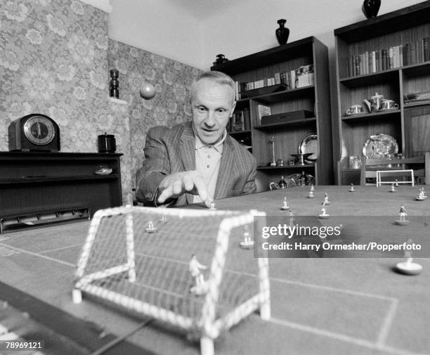 Former Liverpool manager Bill Shankly practicing his Subbuteo skills at home in Liverpool, England, circa May 1976.