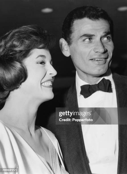 Stage and Screen, London, England, Circa 1950's, American film and movie actor Jeff Chandler and his wife Marjorie Hoshelle arrive at the Columbia...