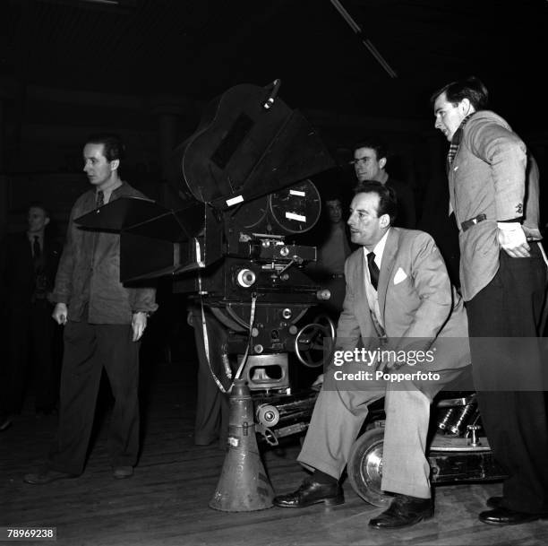 London, England Director Val Guest is pictured making the film "It's a Great Life" at the Hammersmith Palais