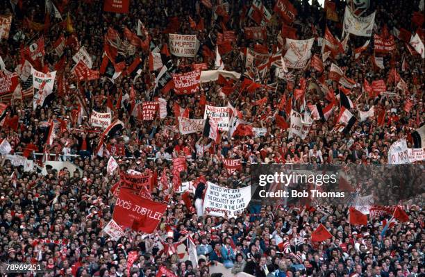 21st May 1977, 1977 FA, Cup Final at Wembley, Manchester United 2 v Liverpool 1, A mass of Manchester United fans waving flags and banners to cheer...