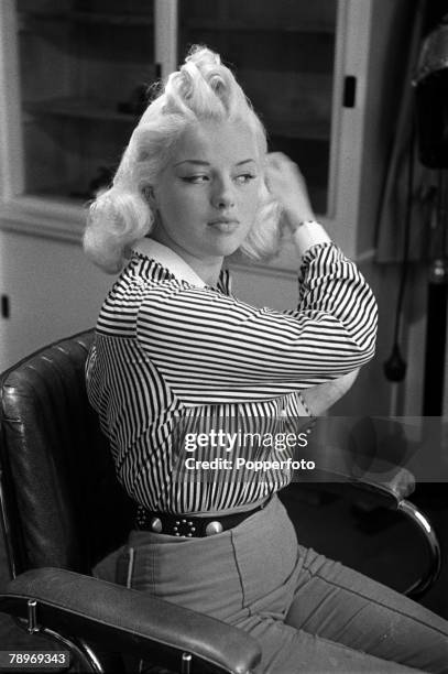 England British actress Diana Dors is pictured prior to having pictures taken which tie in to her new film "Yield to the Night"