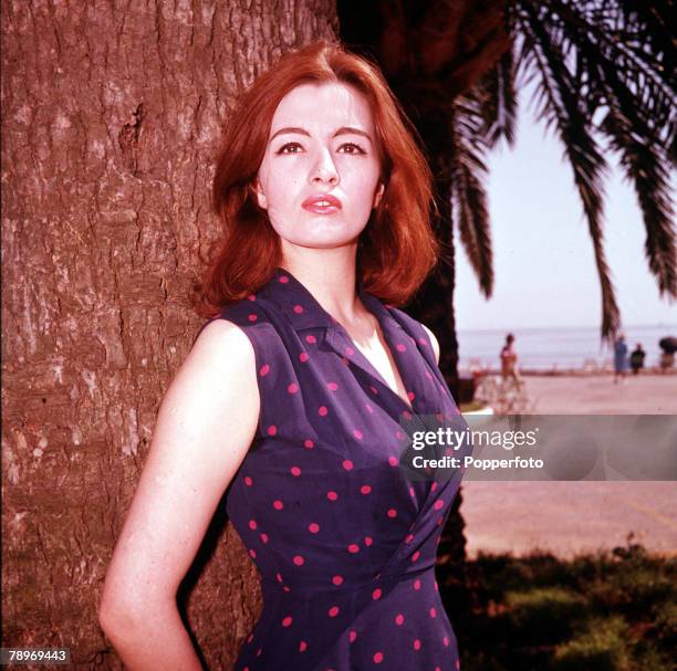 Christine Keeler, key figure in the 1963 Profumo Scandal which rocked the government, wearing a spotty dress, 1963