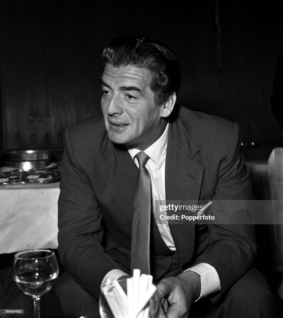 London, England. 1956. American actor Victor Mature is pictured at a press reception at the Savoy Hotel for the film "Interpol".