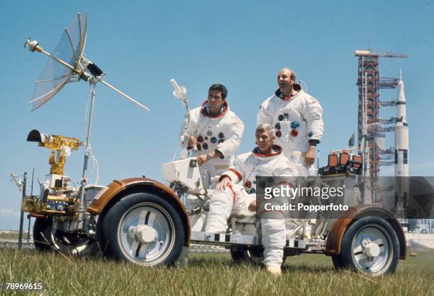 Travel, Space Exploration, pic: 1972, USA, The American crew of NASA's "Apollo 17" with the lunar rover and the Apollo rocket behind, Left-right,...