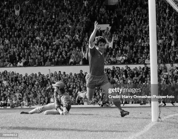 Kevin Keegan of Liverpool celebrates after scoring past Coventry City goalkeeper Jim Blyth during a Football League Division One match at Anfield on...