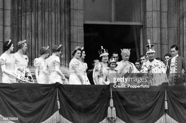 King George VI and Queen Elizabeth with Queen Mary and at the front their children Princess Elizabeth and Princess Margaret on the balcony at...