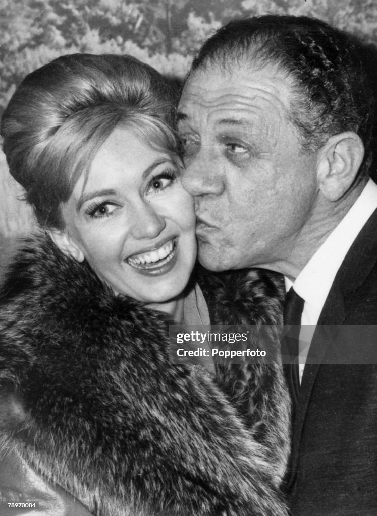 Entertainment. Stage and Screen. pic: November 1964. Northampton, Northamptonshire, England. Comedian Sid James gives film star Janette Scott a kiss at a jazz festival at Northampton Drill Hall.