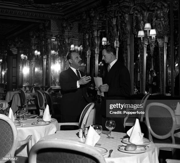 London, England Charles Forte is pictured with the manager of the grill room of the Cafe Royal