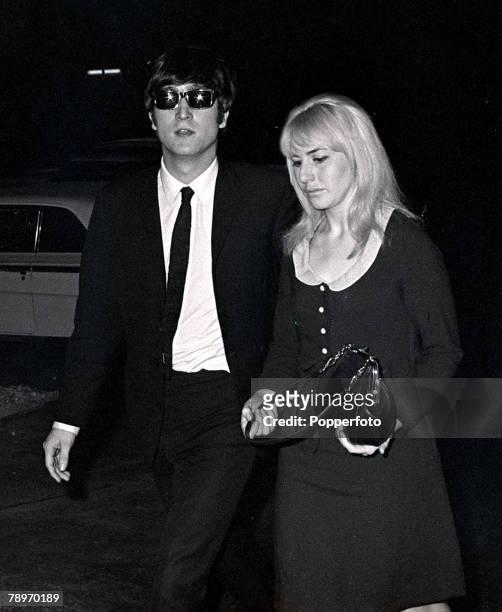 The Beatles 1964 US Tour, John Lennon of British pop group The Beatles with his wife Cynthia in Miami during the band's tour of America, February 13,...