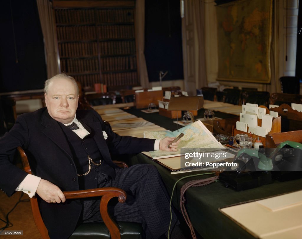 The Book, Volume, 1, Page, 55, Picture, 6. World War II. March, 1945. A picture of British Prime Minister, Winston Churchill pictured at his desk.