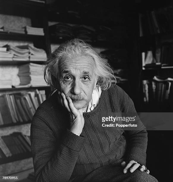 German born American theoretical physicist Albert Einstein in his library study at home on 112 Mercer Street in Princeton, New Jersey, United States...