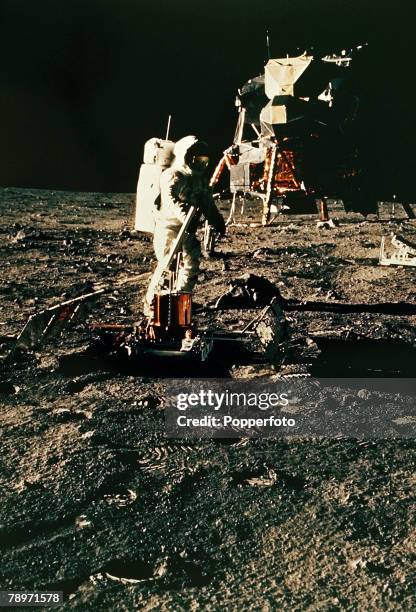 Space Exploration, Apollo 11, pic: 20th July 1969, U,S, Astronaut Buzz Aldrin on the moon's surface examing the sersometer which was left behind on...