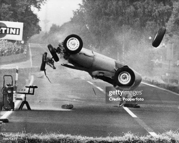 Volume 2, Page 4 picture 4, Sport, Motor Racing, German Grand Prix, Berlin 1959, Hans Hermann crashes his car and flips in mid air, He was uninjured...