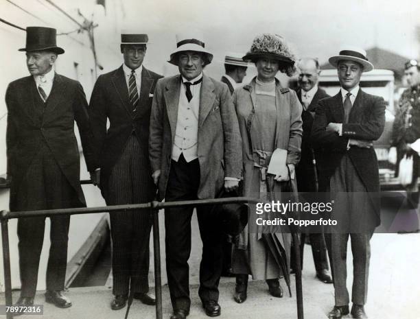 Political Personalities, pic: circa 1930, Stanley Baldwin , Statesman, 1867-1947, centre, and the group all wearing an assortment of hats, including...