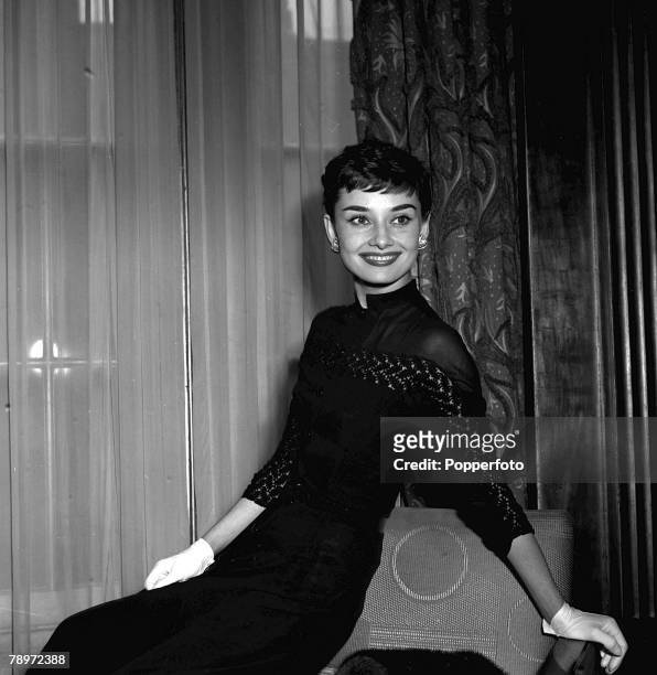 Belgian born US actress Audrey Hepburn smiling at a welcome home party for her at Claridges Hotel in London, 1953