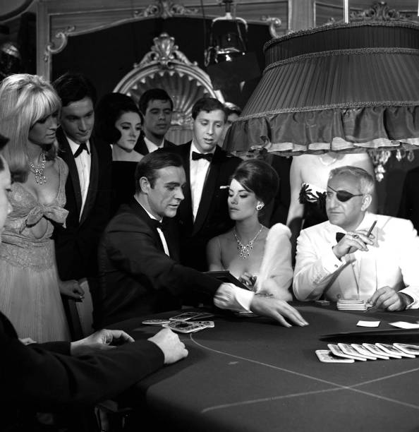 Sean Connery is pictured during the making of the James Bond film "Thunderball", The scene is set in a casino, where Bond , is playing cards with his...
