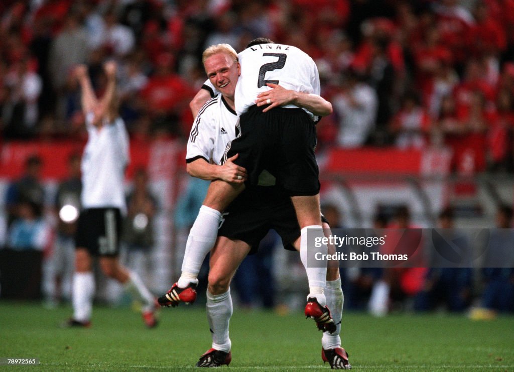 Football. 2002 FIFA World Cup Finals. Semi Final. Seoul, South Korea. 25th June 2002. Germany 1 v South Korea 0. Germany's Thomas Linke (2) and Carsten Ramelow celebrate after their victory.Credit: POPPERFOTO/JOHN McDERMOTT