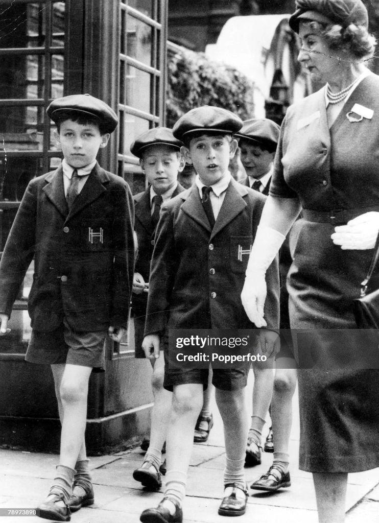 1957. Prince Charles goes for a walk with other pupils while at Hill house school in Knightbridge.