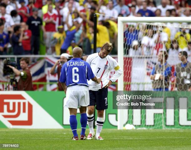Football, 2002 FIFA World Cup Finals, Shizuoka, Japan, 21st June 2002, England 1 v Brazil 2, England captain David Beckham is consoled by Brazil's...