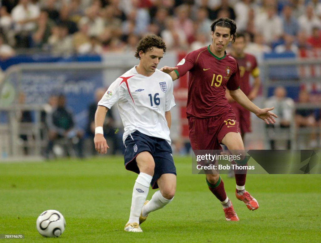 BT Sport. Football. FIFA World Cup. Gelsenkirchen. 1st July 2006. Quarter Final. England 0 v Portugal 0. Portugal won 3 - 1 on Penalties after Extra Time. England's Owen Hargreaves with Portugal's Tiago in close attention.