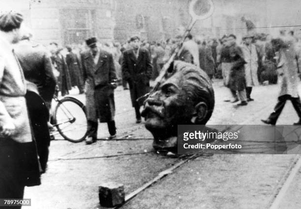 Budapest, Hungary, 1956 Hungarian Uprising, Communism took on new forms and Stalin+s statue was toppled from his pedestal as protestors expressed...